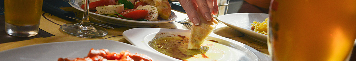 Eating Greek Mediterranean at It's Greek To Me restaurant in Tucson, AZ.